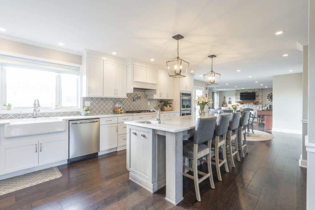 white kitchen with island and seating