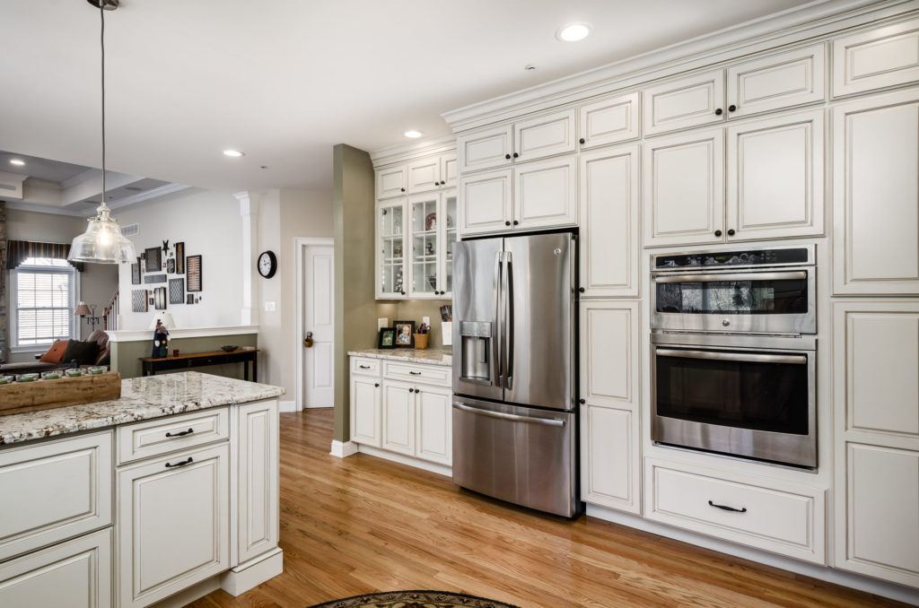 large white kitchen with double oven