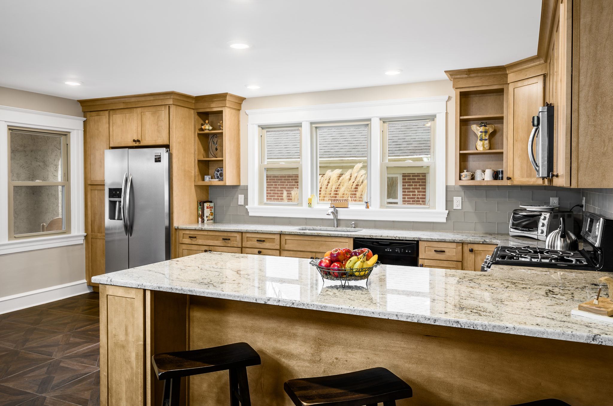 Natural wood with light granite counter top kitchen design