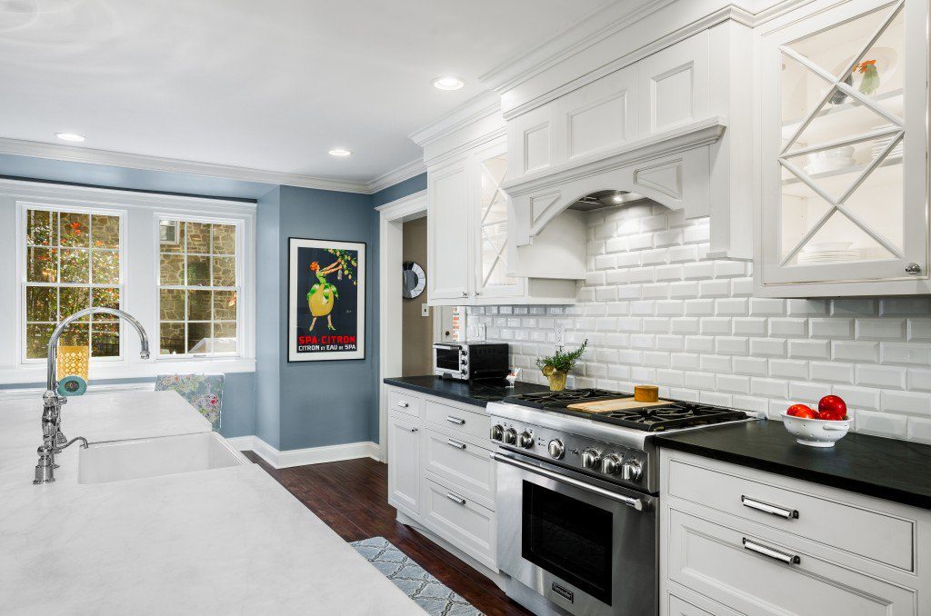 White painted brick helps brighten up this Award Winning kitchen even more