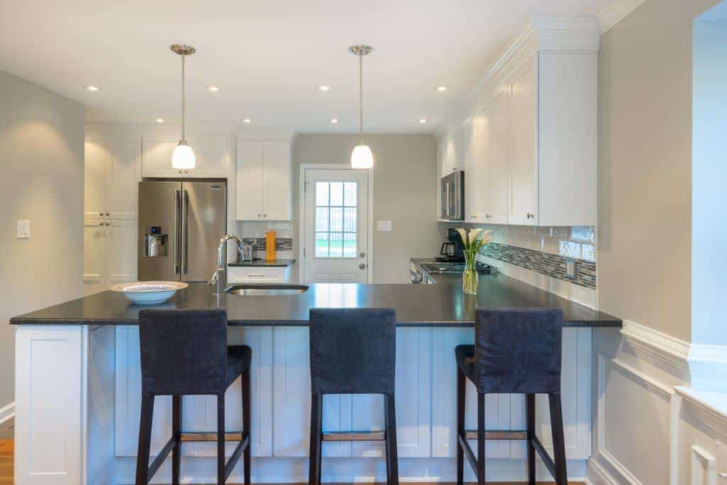 Kitchen with granite countertop.