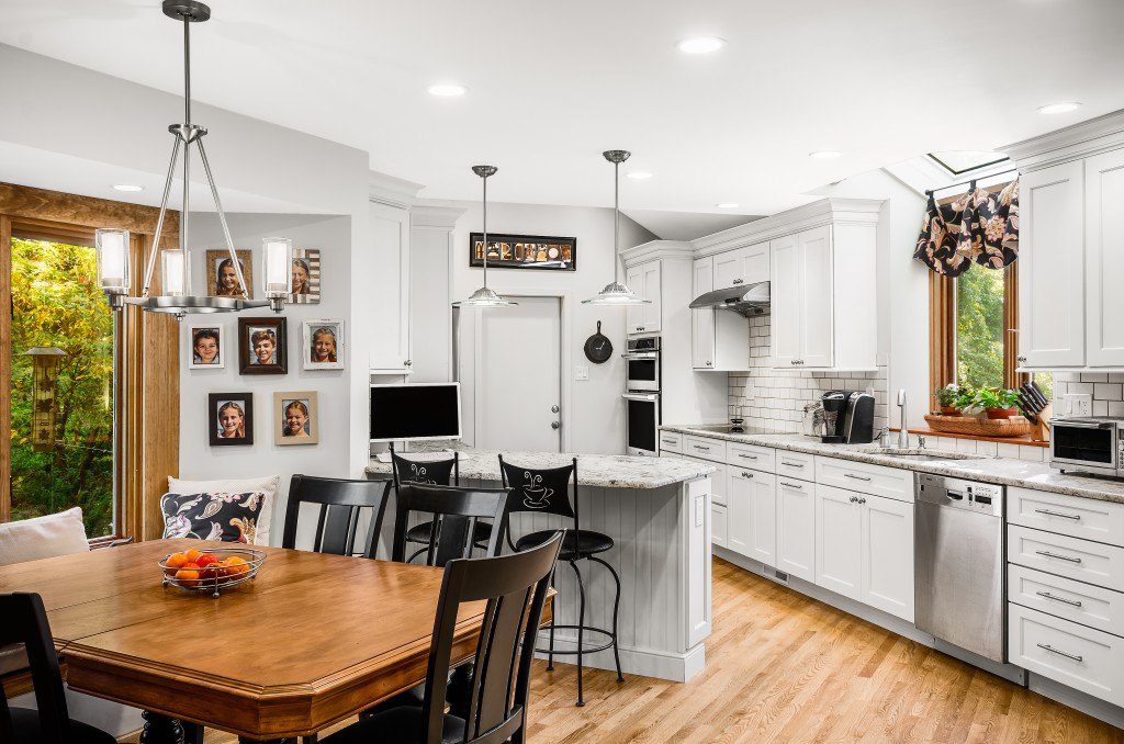 The kitchen decor matches seamlessly with the dining room