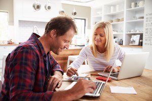 Kitchen Financing. Photo of designer helping customer.