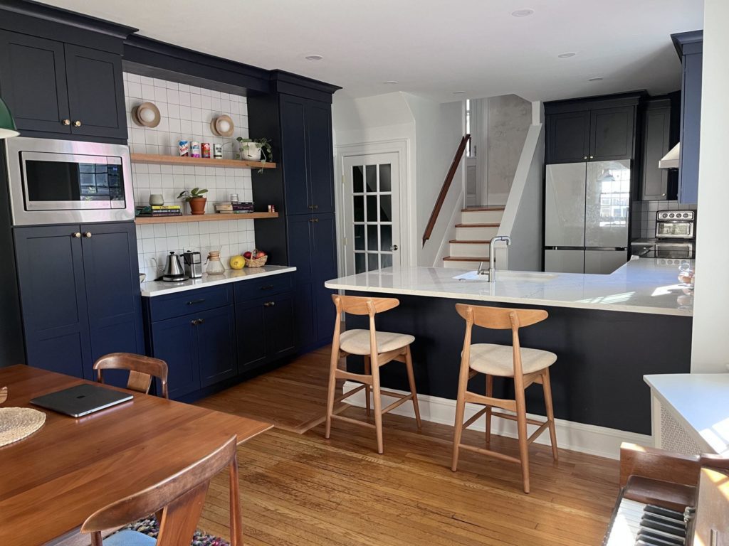 blue kitchen with peninsula 