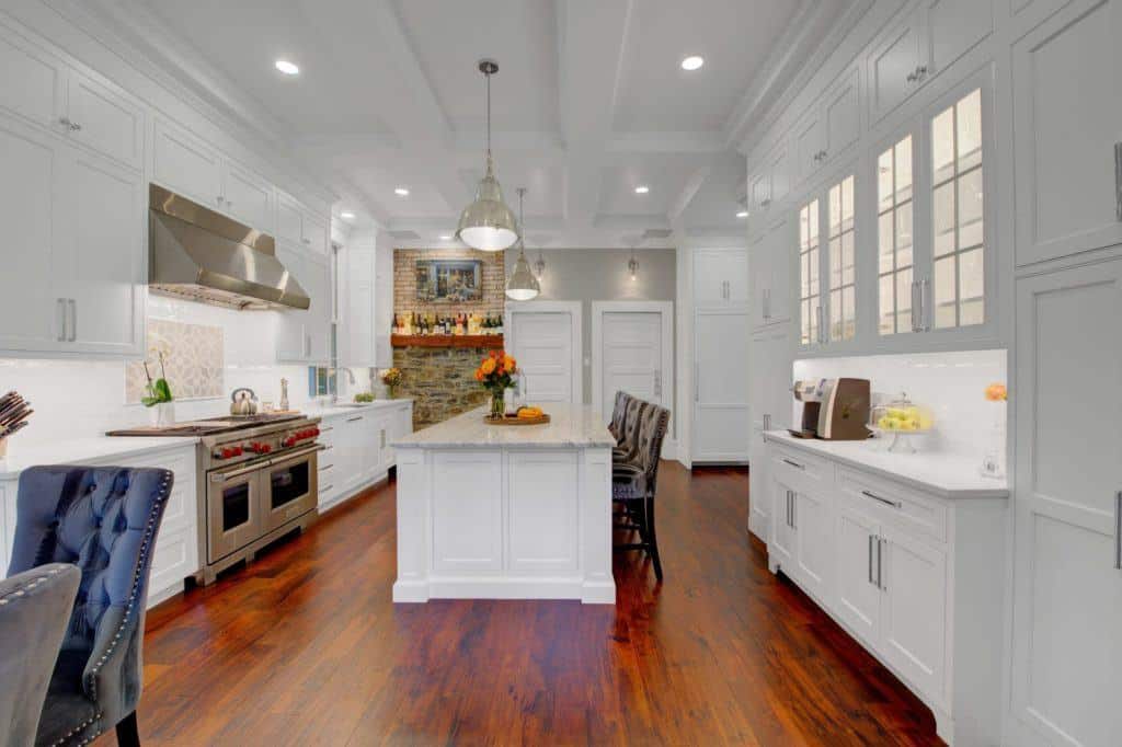 large white kitchen with large island and seating 