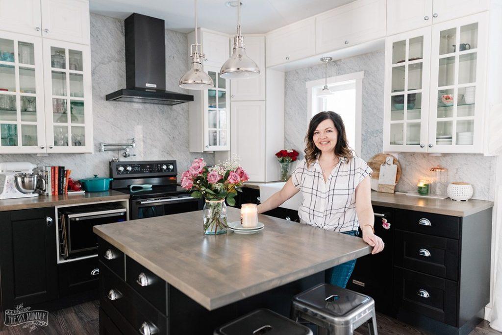 black and white kitchen with small island 