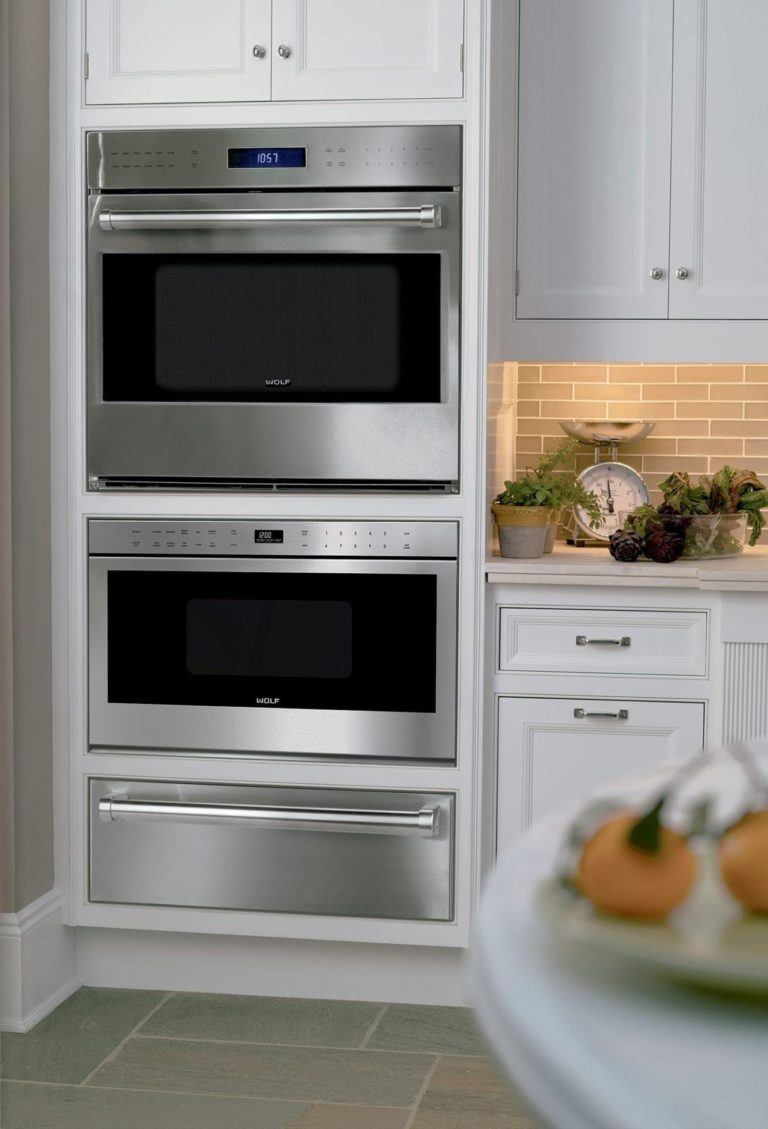 Inset cabinetry with flush mount oven