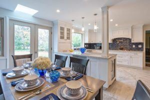 Kitchen with post on the end of the island These are Brighton Custom inset cabinets. Beware when buying kitchen cabinets in lesser made brands