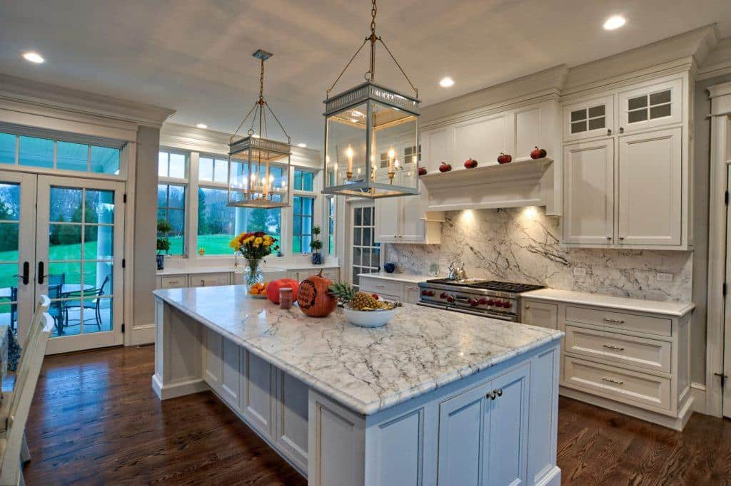 Beautiful Ornate kitchen with moldings painted to match cabinetry.