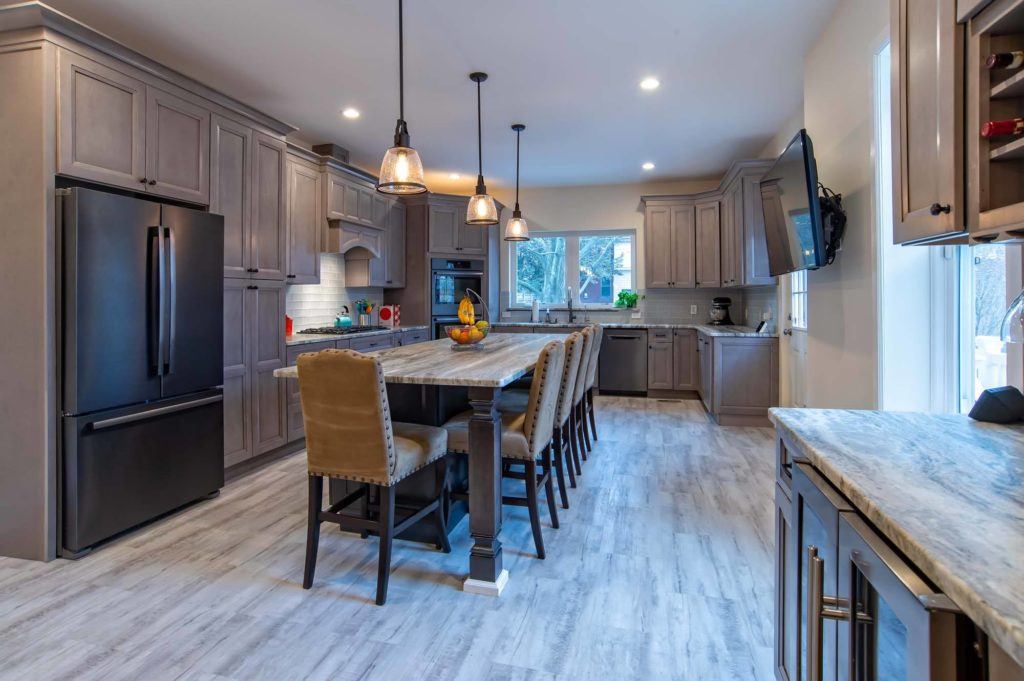 Open concept kitchen with dining room table 