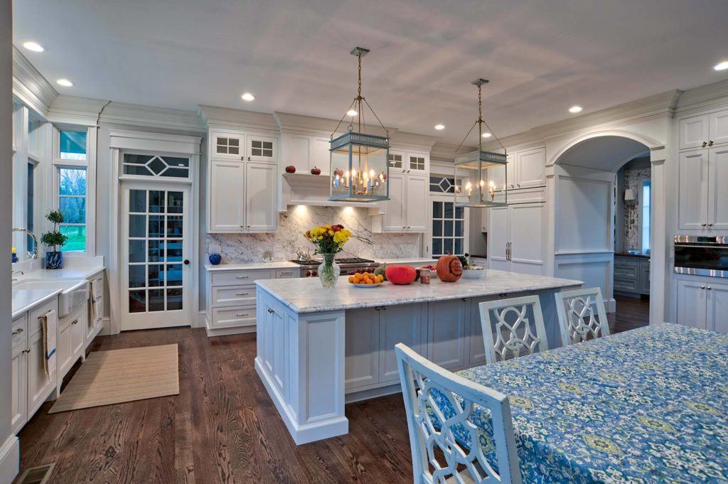 open concept kitchen with dining room table 