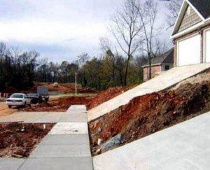 driveway installed too steep. Major construction mistake.
