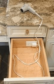 outlet in cabinet drawer
