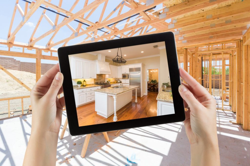 person using iPad to envision a kitchen design 