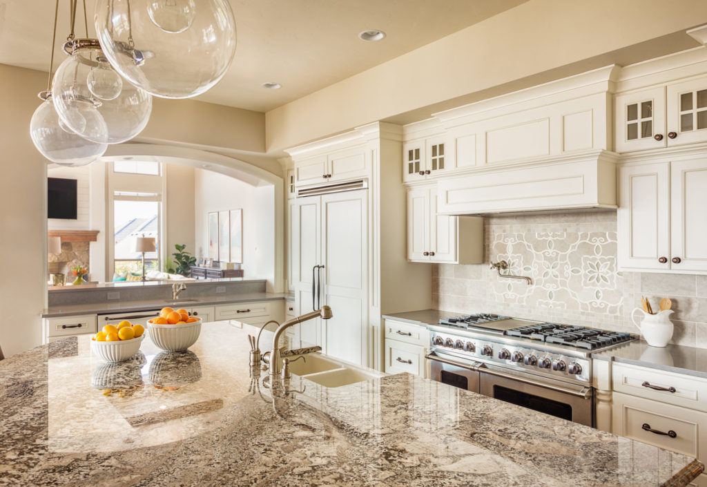 White kitchen with large island 