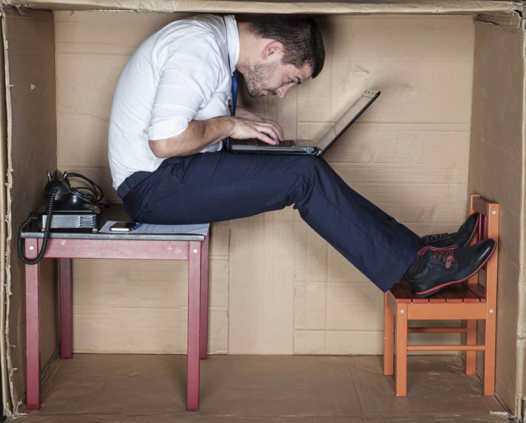 Man crammed in box