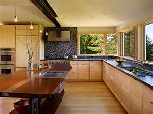 Natural wood kitchen in Shaker style but much more modern looking